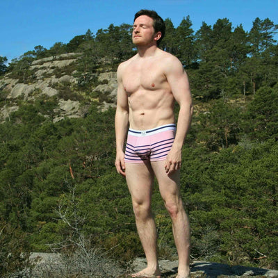 Pink organic cotton men's trunks with navy stripes